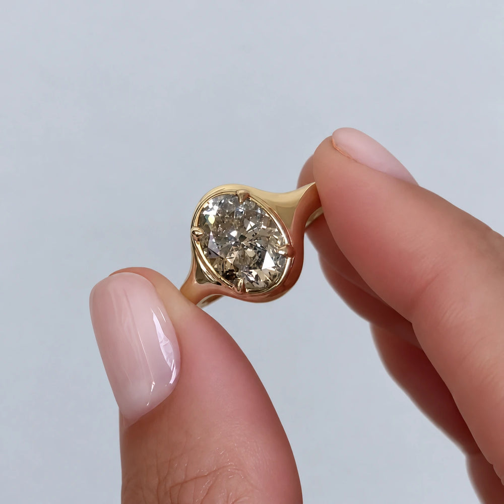 Amélie Bezel 1.5ct Oval Solitaire Ring