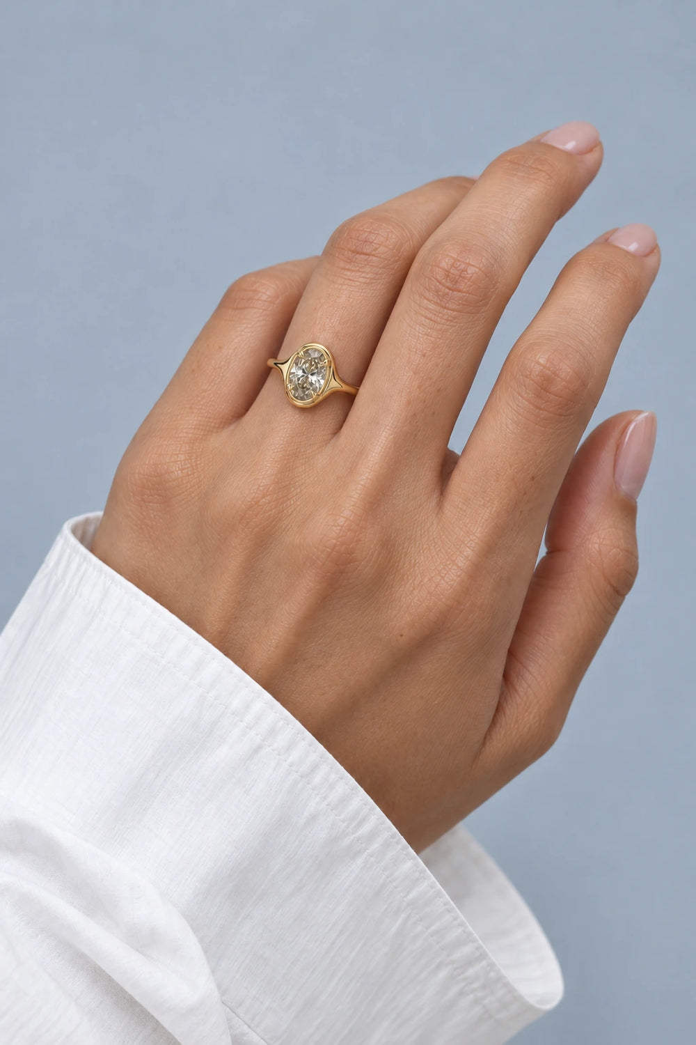 Amélie Bezel 1.5ct Oval Solitaire Ring