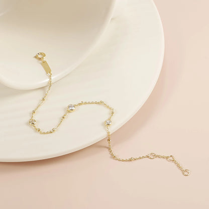Nyla gold bubble bracelet with its clasp and extension chain visible